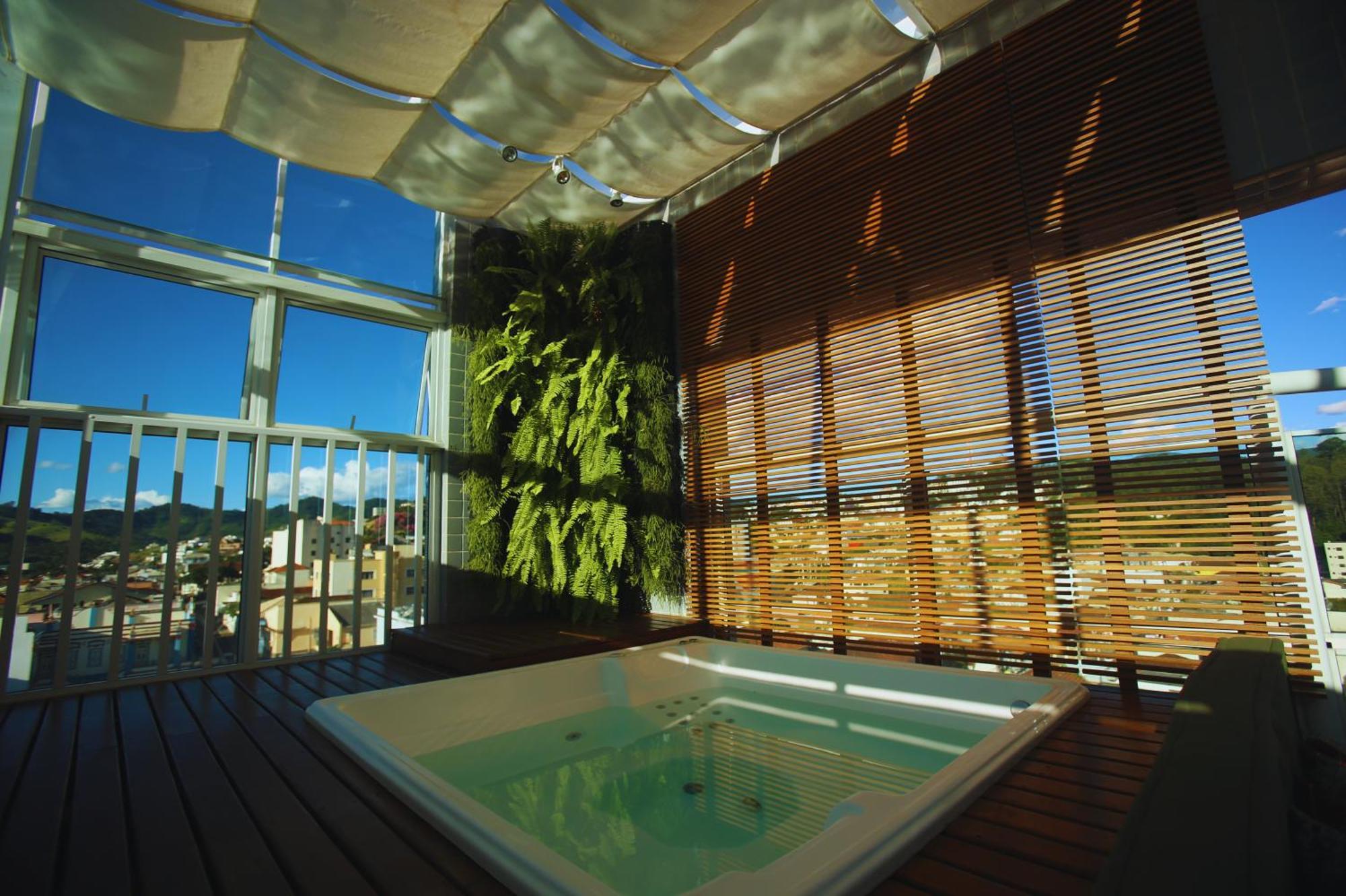 Gontijo Inn Hotel Itajubá Buitenkant foto A rooftop spa